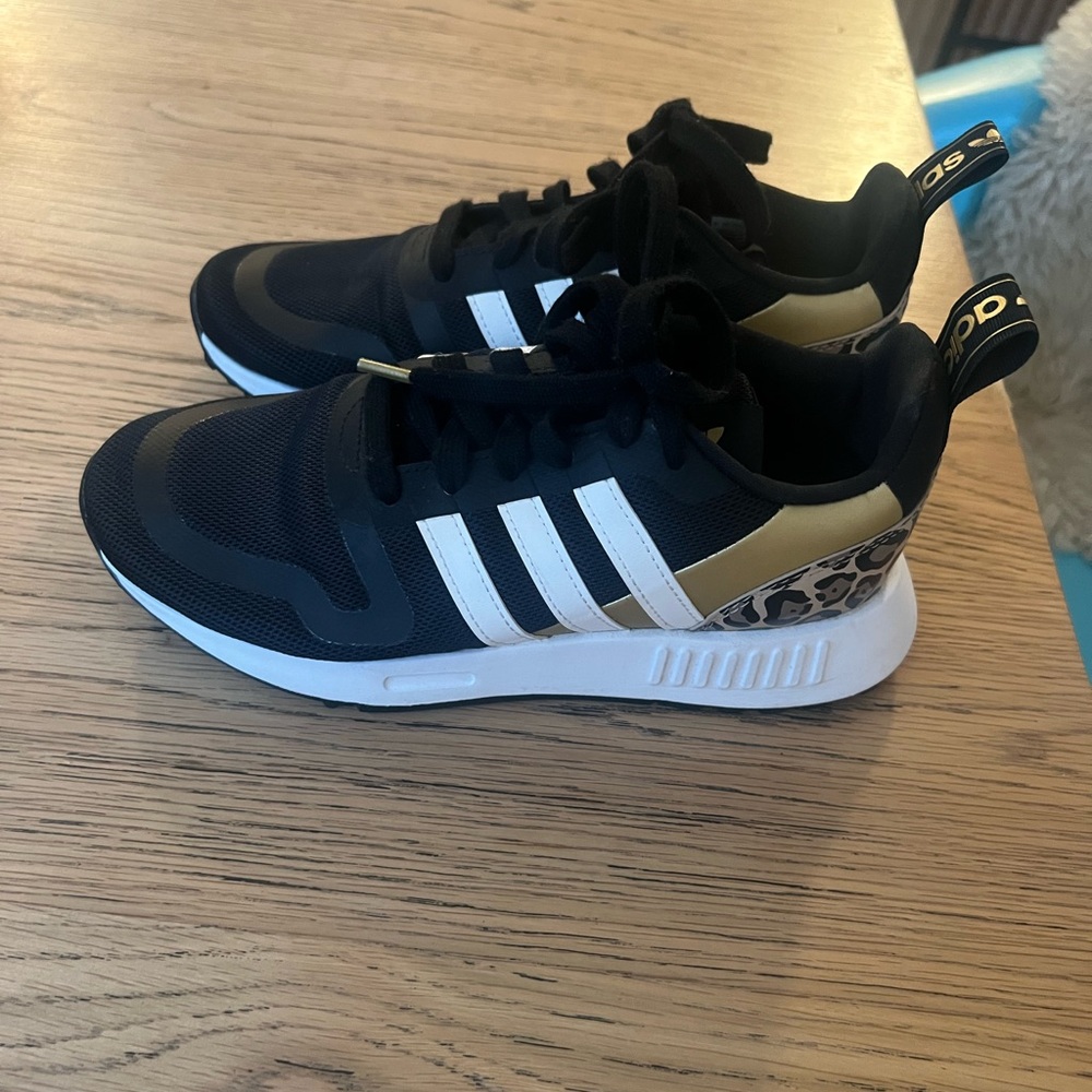 Adidas Black and Gold Sneakers